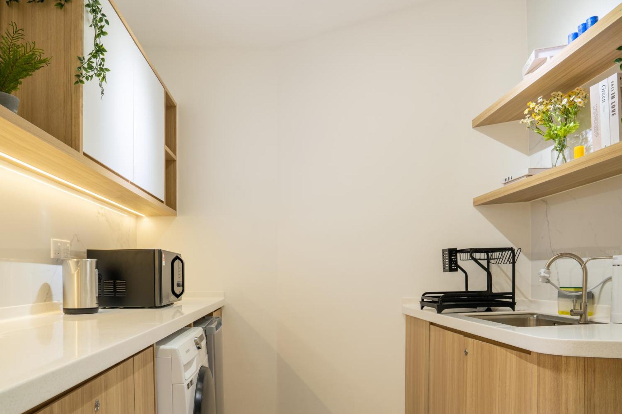 The Nest At The Shore Kk Cbd Seaview With Balcony Apartment